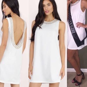 White low back swing dress